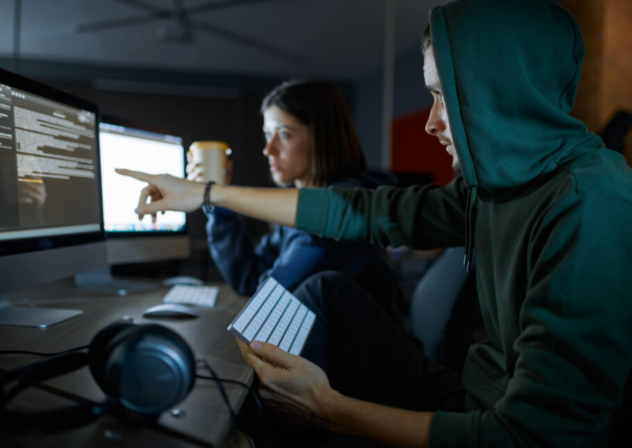 Two hackers working on a watering hole attack